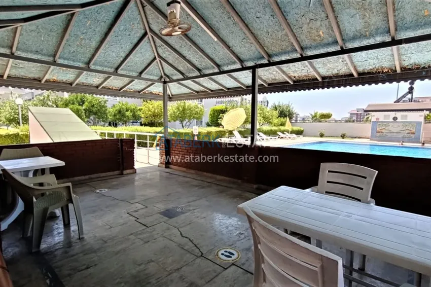 Квартира в Махмутларе с мебелью в жилом комплексе рядом с морем 11 