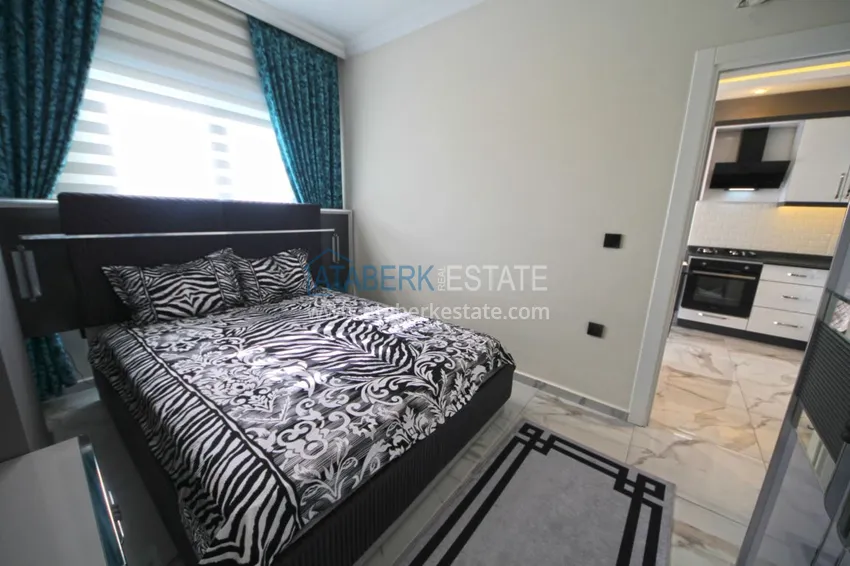 Приобрести Новая квартира в Махмутларе с мебелью, видом на море в современном комплексе  12 