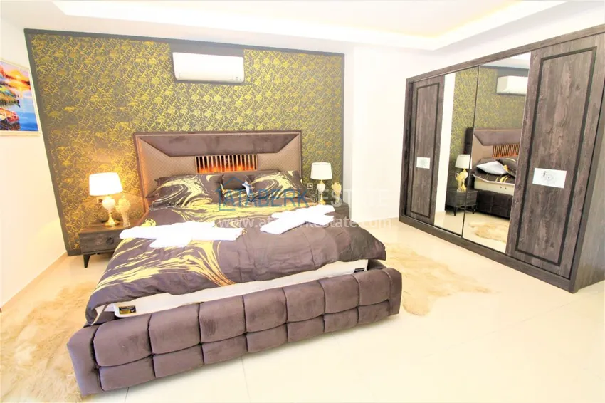 Приобрести Квартира в Махмутларе с мебелью, застекленным балконом в благоустроенной резиденции 14 