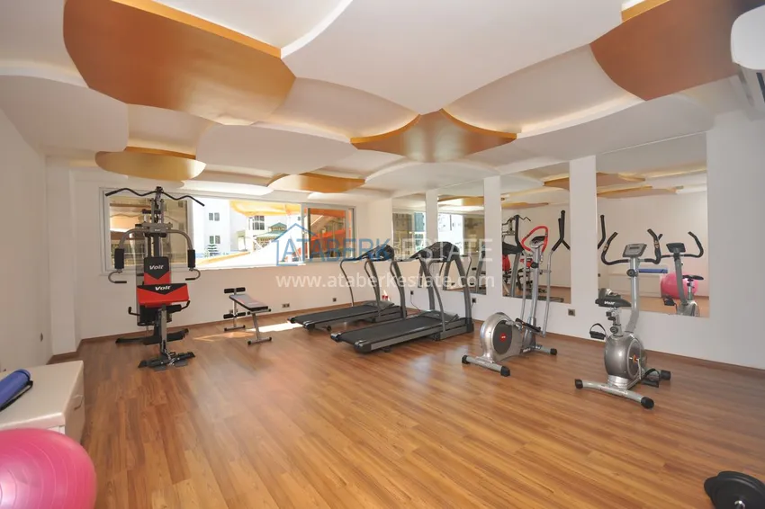 Квартира в Махмутларе с мебелью, застекленным балконом в благоустроенной резиденции 23 