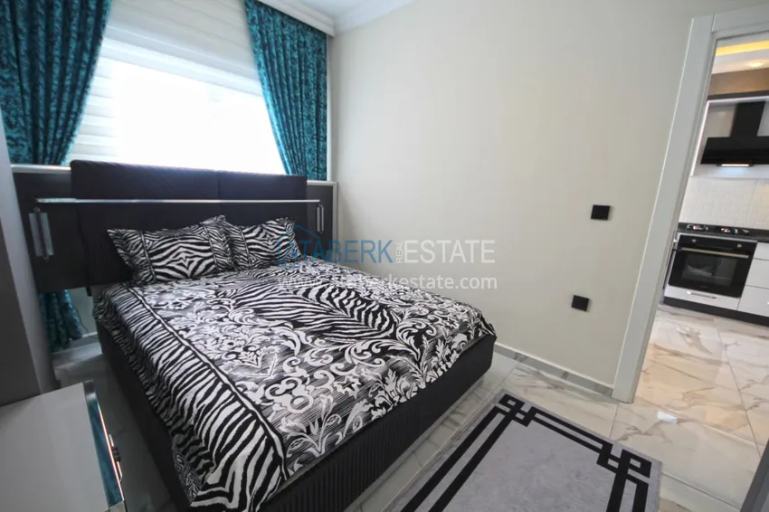 Приобрести Новая квартира в Махмутларе с мебелью, видом на море в современном комплексе  14 