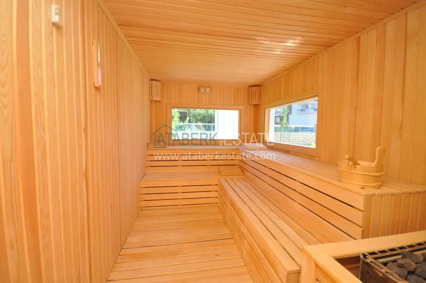 Квартира в Махмутларе с мебелью, застекленным балконом в благоустроенной резиденции 26 