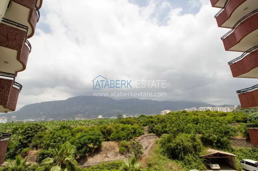 Приобрести Квартира в Махмутларе с 3 спальнями, мебелью, видом на горы 15 