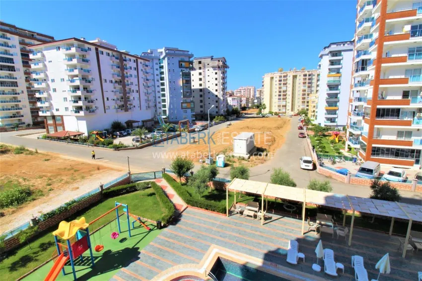 Приобрести Квартира в Махмутларе с мебелью, застекленным балконом в благоустроенной резиденции 16 