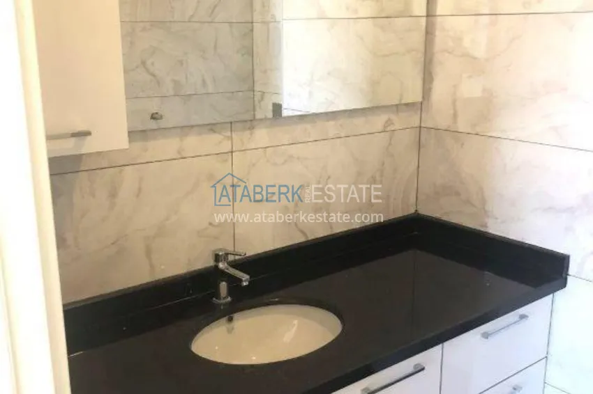 Приобрести Пентхаус в центре Алании с открытым видом на море в молодой резиденции 19 