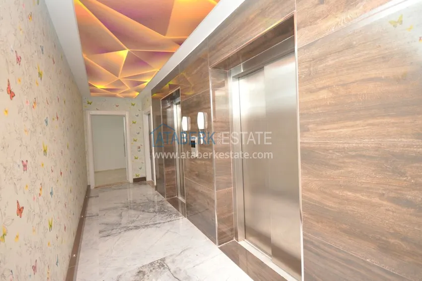 Квартира в Махмутларе с мебелью, застекленным балконом в благоустроенной резиденции 28 