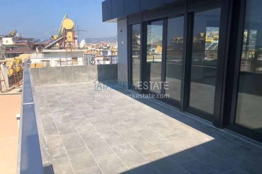 Приобрести Пентхаус в центре Алании с открытым видом на море в молодой резиденции 20 