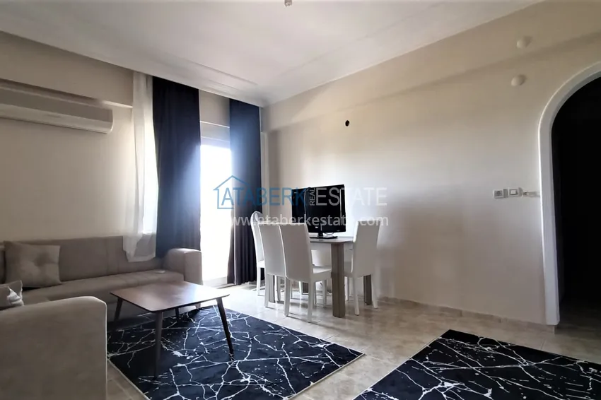 Приобрести Квартира в Махмутларе с мебелью в жилом комплексе рядом с морем 1 