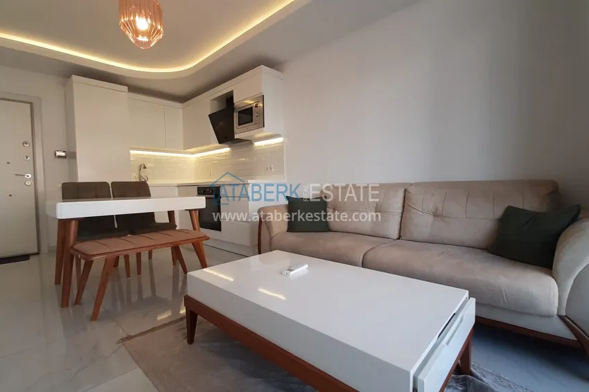 Приобрести Квартира в центре Алании, с мебелью в комплексе с собственным пляжем 1 