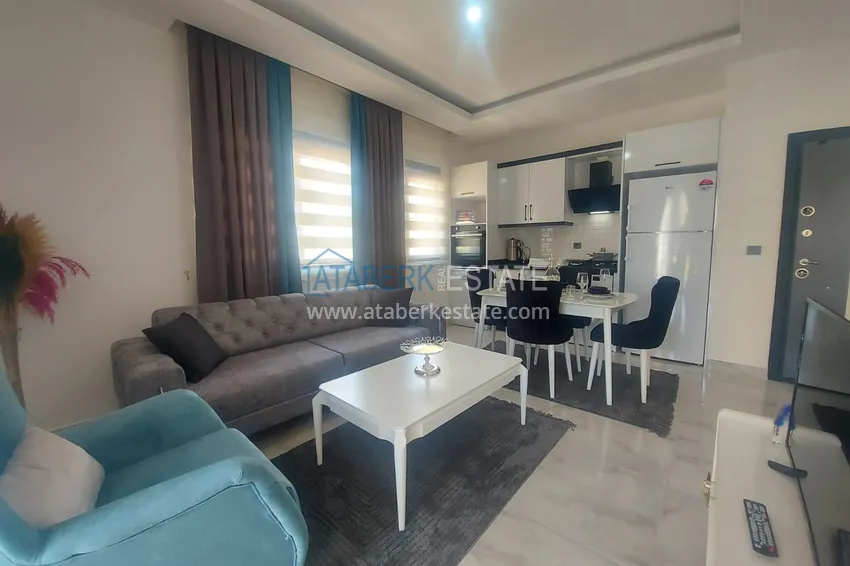 Приобрести Квартира в Махмутларе с новой мебелью в молодом элитном комплексе 1 