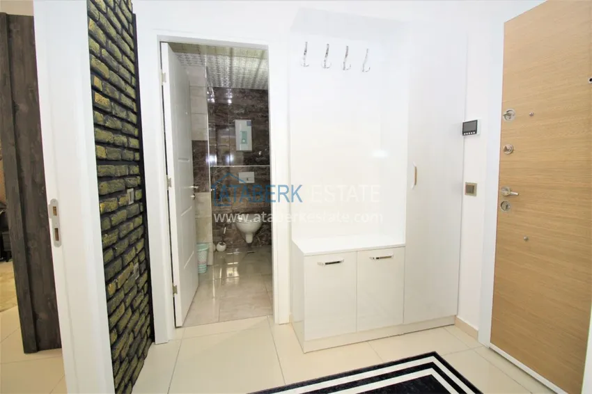 Приобрести Квартира в Махмутларе с мебелью, застекленным балконом в благоустроенной резиденции 1 