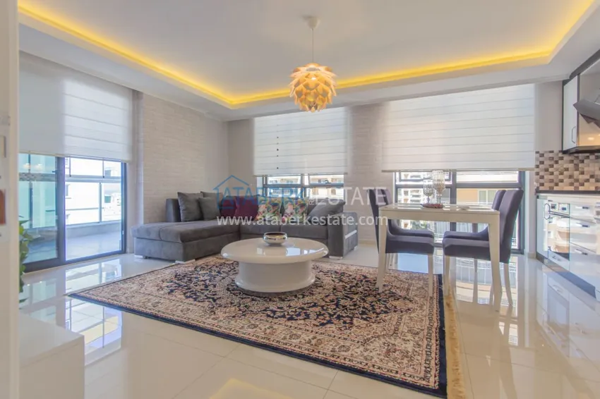 Приобрести Квартира в Махмутларе с новой мебелью, застекленным балконом 3 