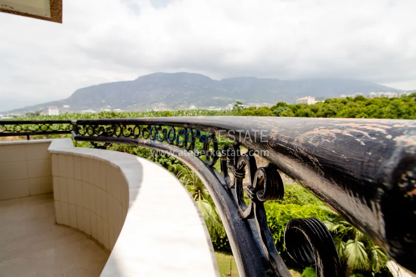 Приобрести Квартира в Махмутларе с 3 спальнями, мебелью, видом на горы 24 