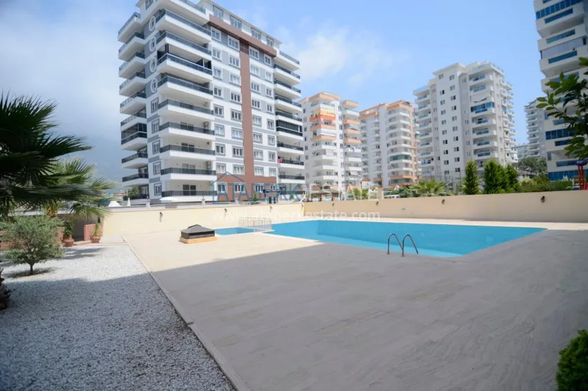 Квартира в Махмутларе – 2 спальни, отдельная кухня, застекленный балкон  2 