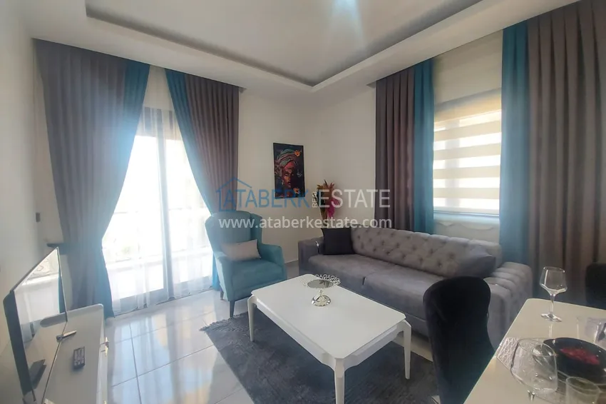 Приобрести Квартира в Махмутларе с новой мебелью в молодом элитном комплексе 2 