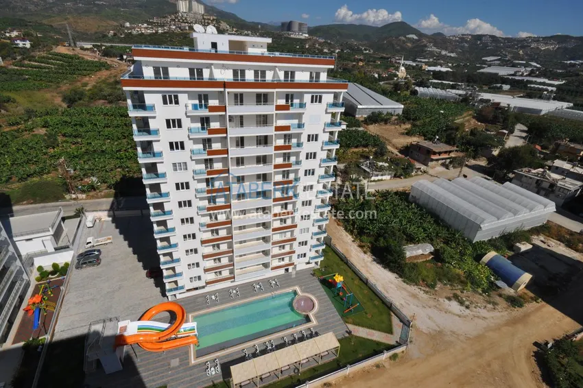 Квартира в Махмутларе с мебелью, застекленным балконом в благоустроенной резиденции 3 