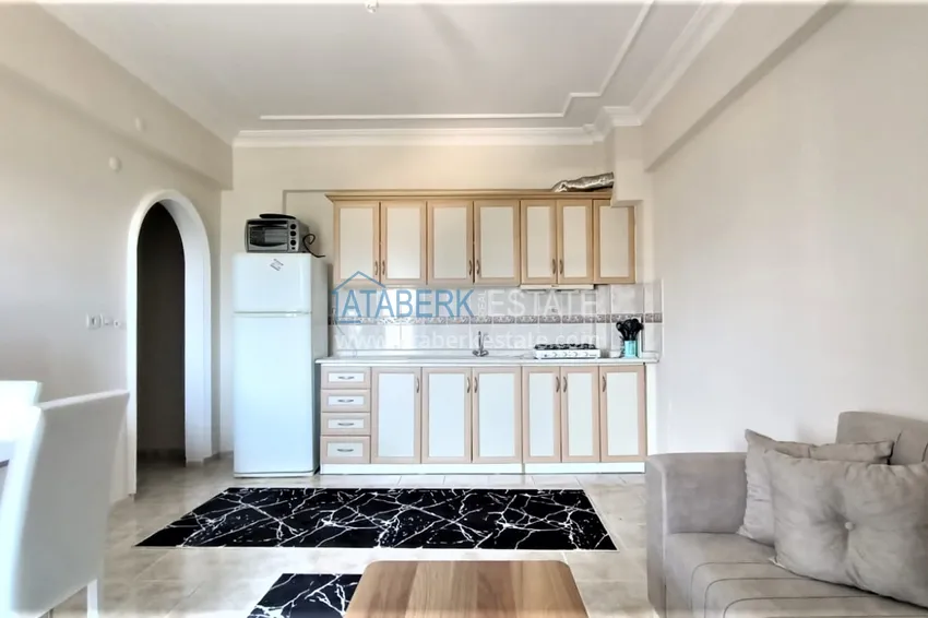 Приобрести Квартира в Махмутларе с мебелью в жилом комплексе рядом с морем 2 