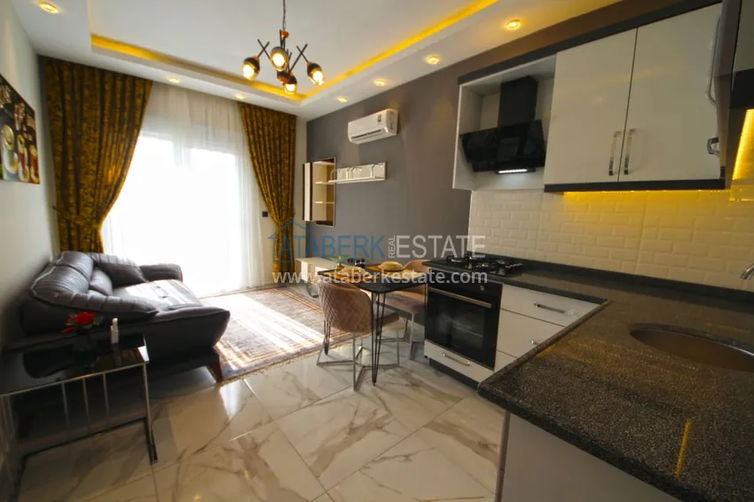 Приобрести Новая квартира в Махмутларе с мебелью, видом на море в современном комплексе  3 