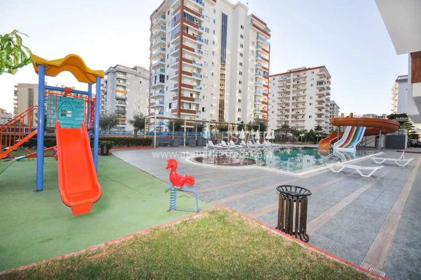 Квартира в Махмутларе с мебелью, застекленным балконом в благоустроенной резиденции 5 