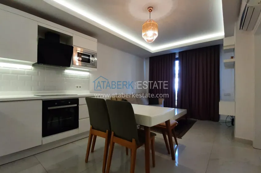 Приобрести Квартира в центре Алании, с мебелью в комплексе с собственным пляжем 4 