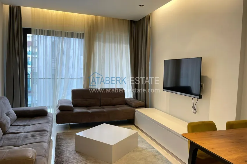 Приобрести Квартира в районе Оба с мебелью на первой береговой линии 4 