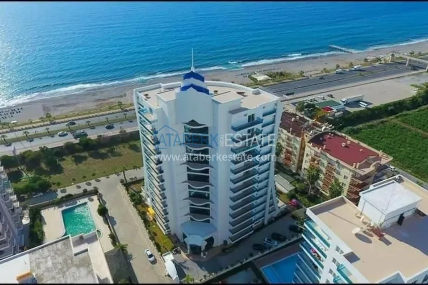 Квартира в районе Махмутларе меблированная в комплексе премиум класса на первой линии 4 