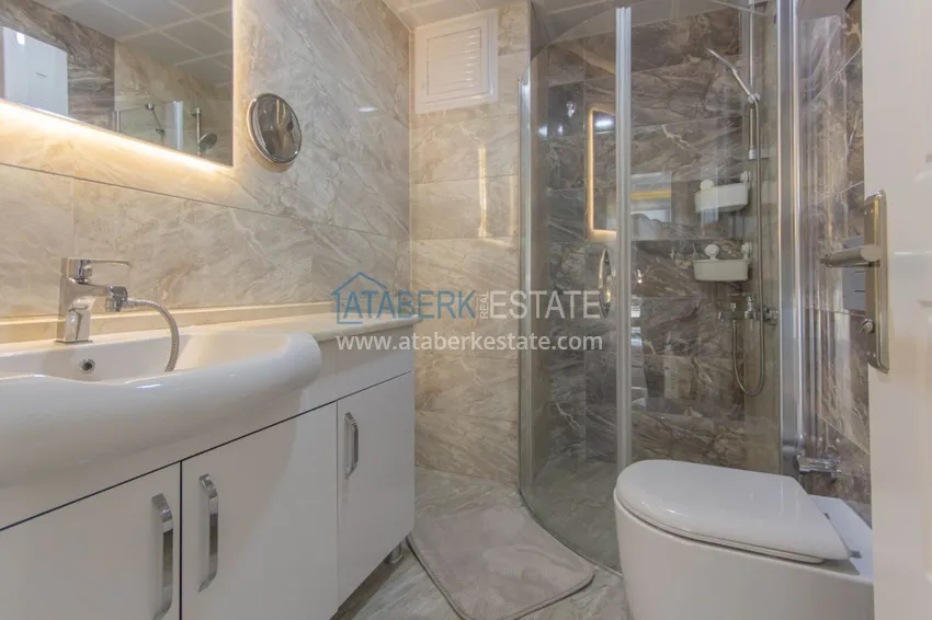 Приобрести Квартира в Махмутларе с новой мебелью, застекленным балконом 12 