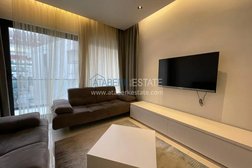 Приобрести Квартира в районе Оба с мебелью на первой береговой линии 5 