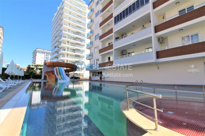 Квартира в Махмутларе с мебелью, застекленным балконом в благоустроенной резиденции 8 