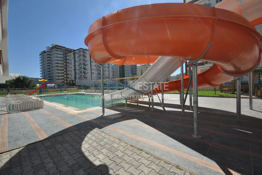 Квартира в Махмутларе с мебелью, застекленным балконом в благоустроенной резиденции 9 