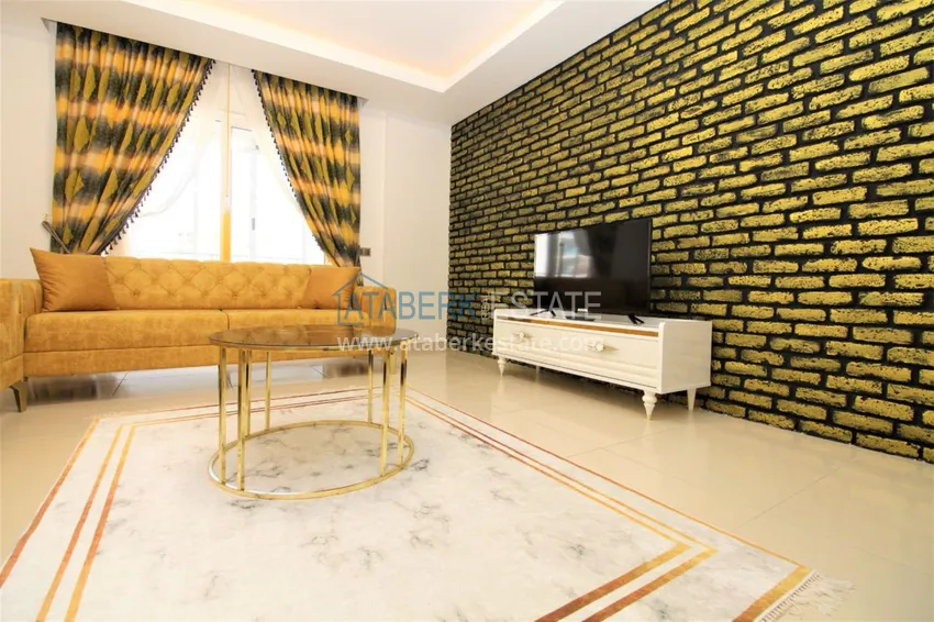 Приобрести Квартира в Махмутларе с мебелью, застекленным балконом в благоустроенной резиденции 7 