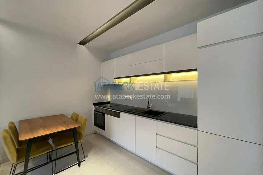 Приобрести Квартира в районе Оба с мебелью на первой береговой линии 9 