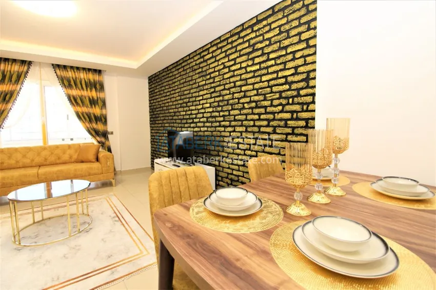 Приобрести Квартира в Махмутларе с мебелью, застекленным балконом в благоустроенной резиденции 9 