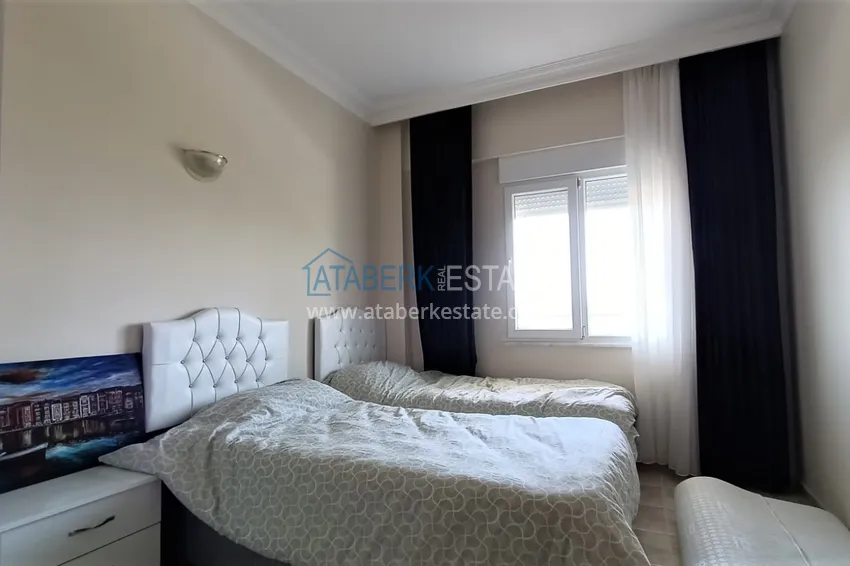 Приобрести Квартира в Махмутларе с мебелью в жилом комплексе рядом с морем 9 