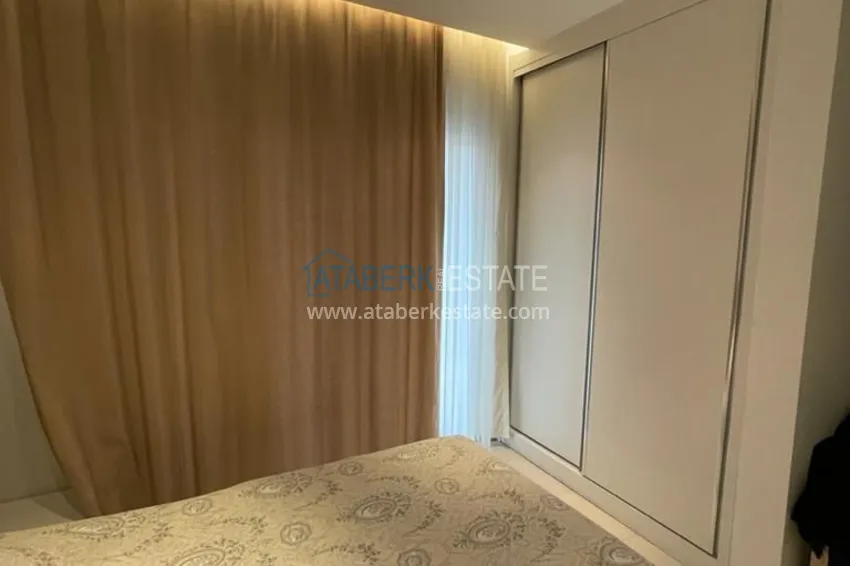 Приобрести Квартира в районе Оба с мебелью на первой береговой линии 10 