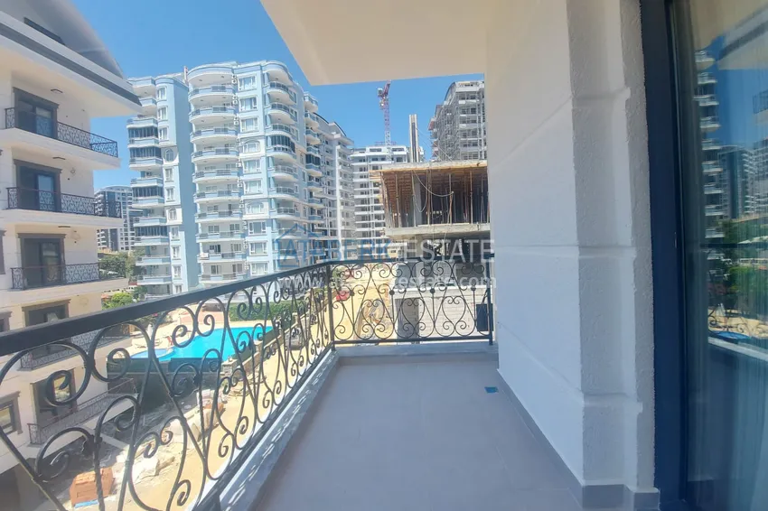 Приобрести Квартира в Махмутларе с новой мебелью в молодом элитном комплексе 9 