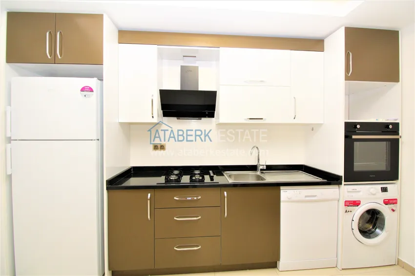 Приобрести Квартира в Махмутларе с мебелью, застекленным балконом в благоустроенной резиденции 10 