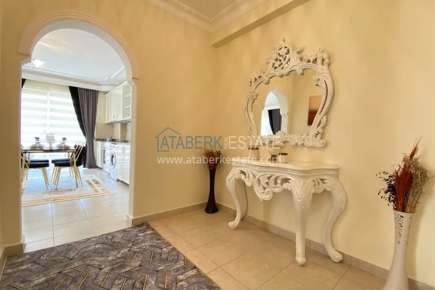 Приобрести Квартира в центре Махмутлара с 3 балконами и частичным видом на море 1 