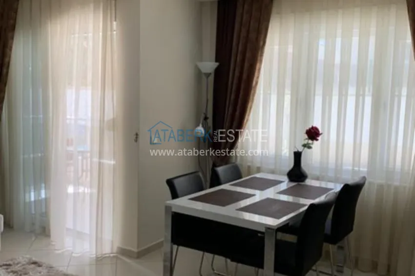 Приобрести Трехкомнатная квартира в Алании с мебелью в районе пляжа Клеопатра 12 