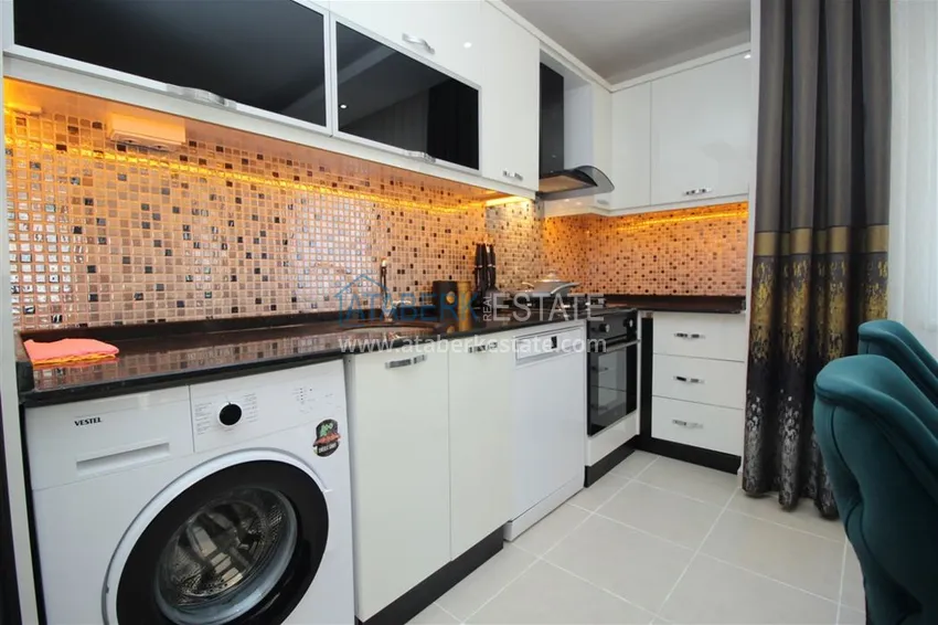 Приобрести Квартира в Махмутларе с мебелью по доступной цене рядом с морем 11 