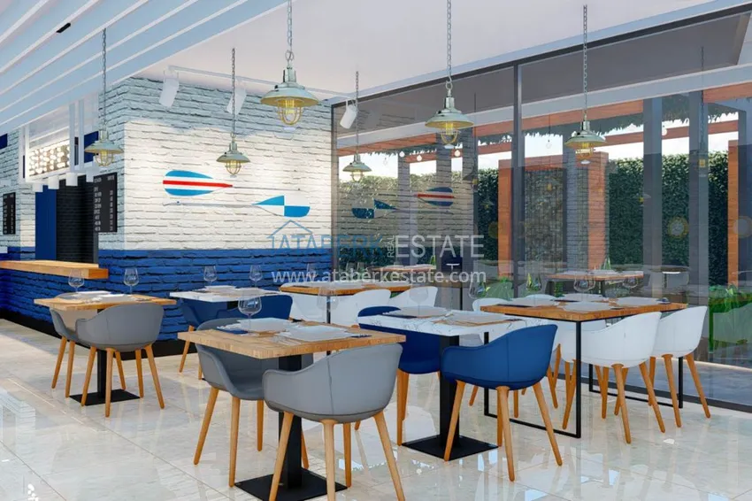 Двухкомнатная квартира в центре Алании с частичным видом на море в строящемся комплексе  12 