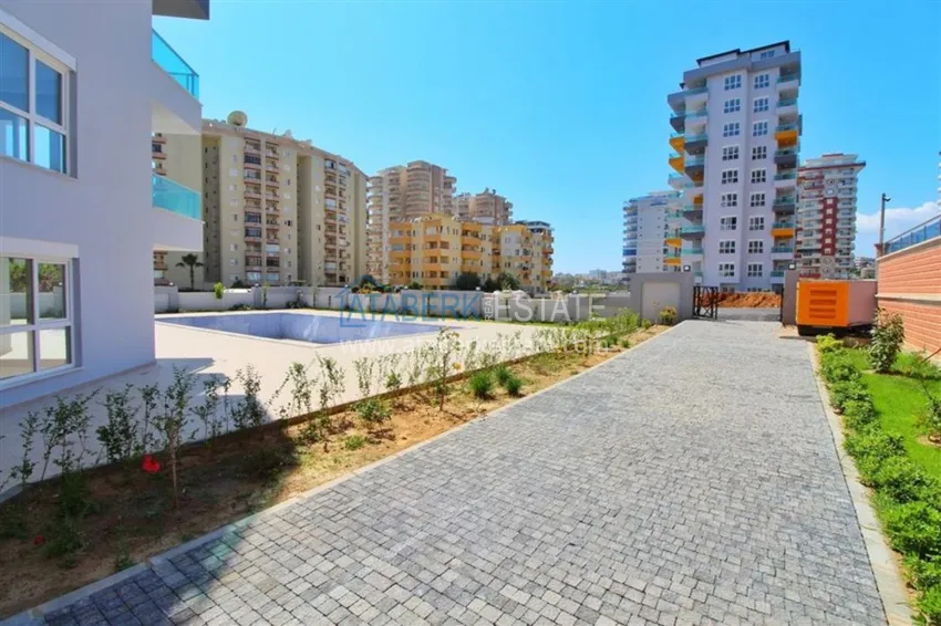 Квартира меблированная в молодом современном комплексе в Махмутларе  13 