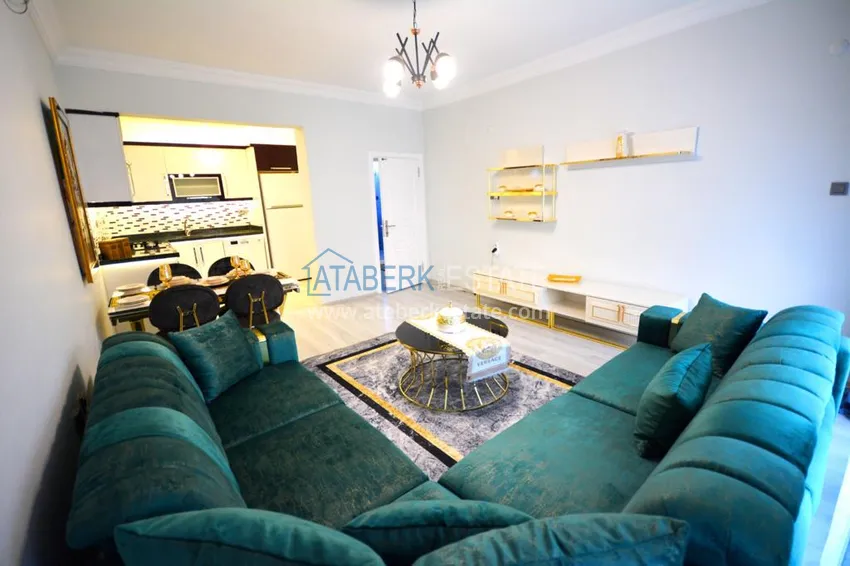 Приобрести Квартира в Махмутларе с современной новой мебелью на центральной улице 10 