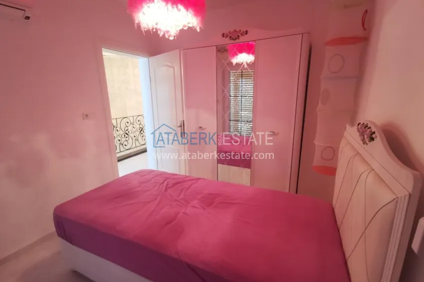 Приобрести Вилла в районе Демирташ с мебелью, садиком и великолепным видом на море  14 