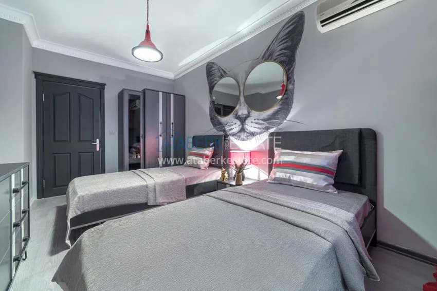 Приобрести Квартира в Махмутларе трехкомнатная со стильным интерьером  10 