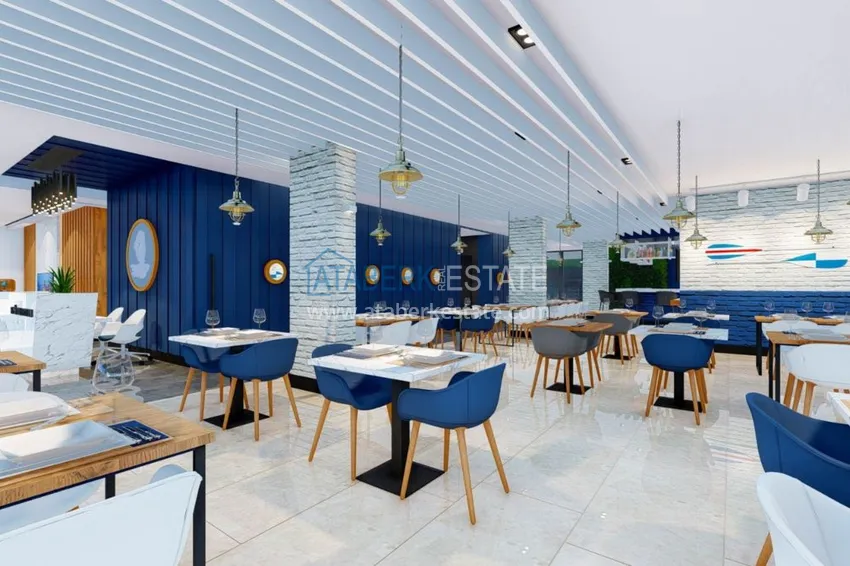 Двухкомнатная квартира в центре Алании с частичным видом на море в строящемся комплексе  13 