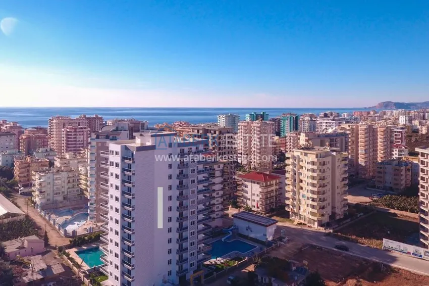 Квартира с мебелью в Махмутларе в благоустроенном комплексе 11 