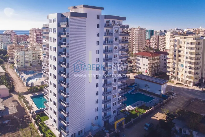 Квартира с мебелью в Махмутларе в благоустроенном комплексе 12 