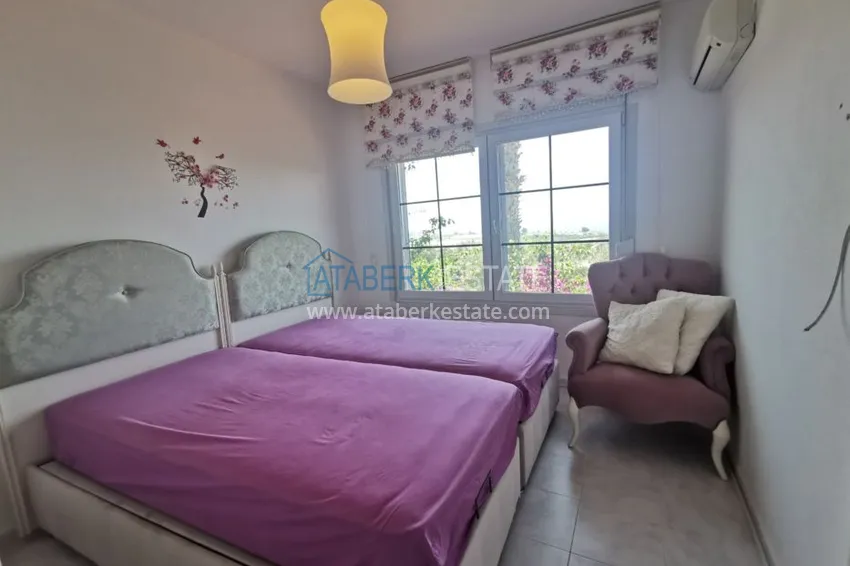 Приобрести Вилла в районе Демирташ с мебелью, садиком и великолепным видом на море  15 