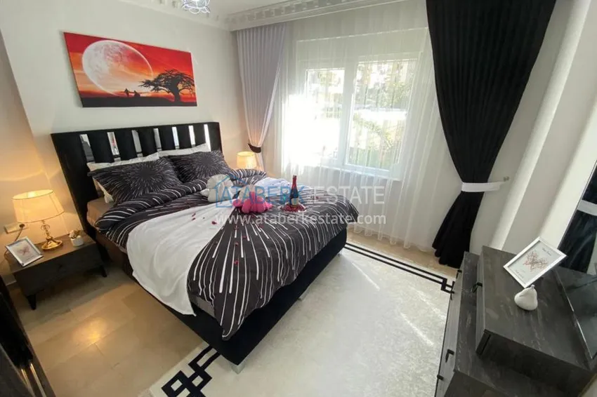 Приобрести Квартира в Махмутларе с современным интерьером, в комплексе рядом с морем 11 